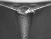 Macro shot of an edge with a built-up edge of welded workpiece material
