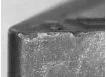 Macro shot of an edge with fine chipping along the whole length of the cutting edge