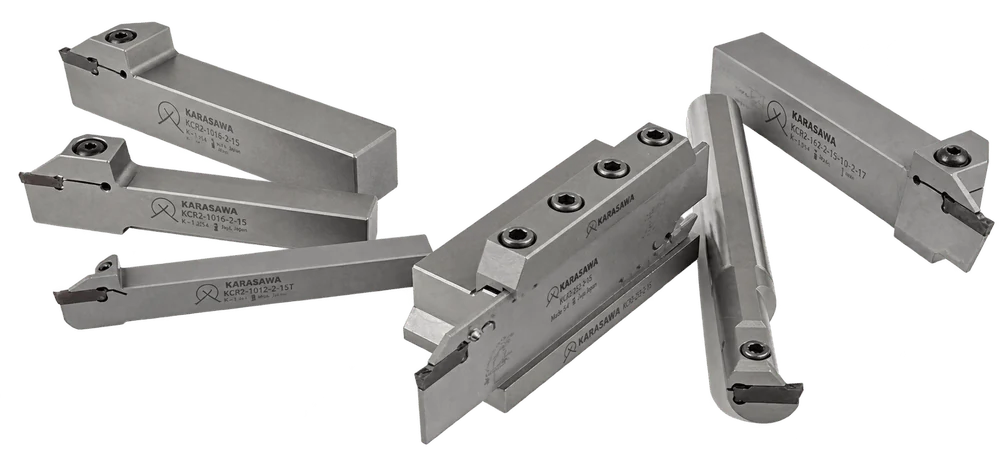 KARASAWA grooving and parting toolholders: external tools with square shanks, an internal bar with a round shank, and a parting blade in a block holder